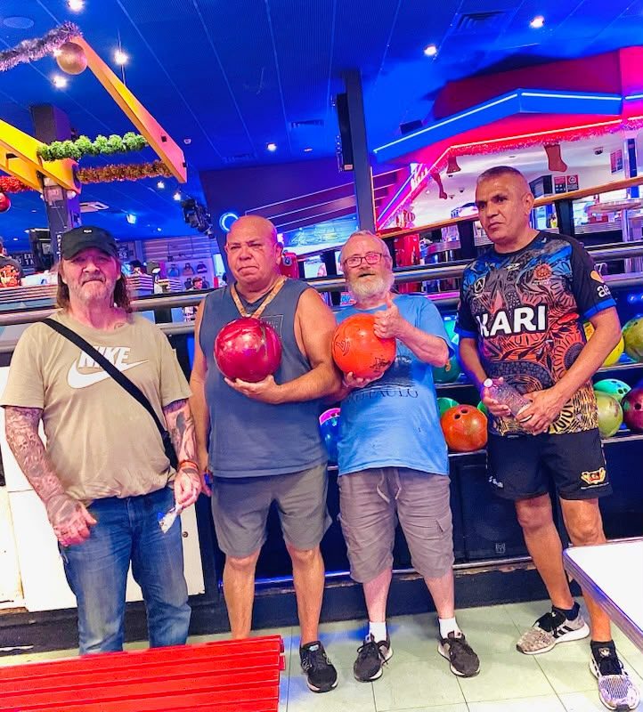 Participants enjoying a night out tenpin bowling